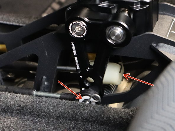 Re-install the shifter cables. Use the supplied clip for the LH cable, and rotate the RH cable so it clips onto the new cup.