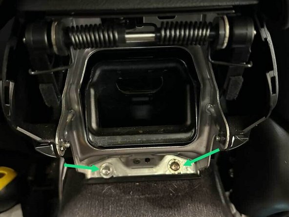 Remove the two 10mm bolts that are visible.