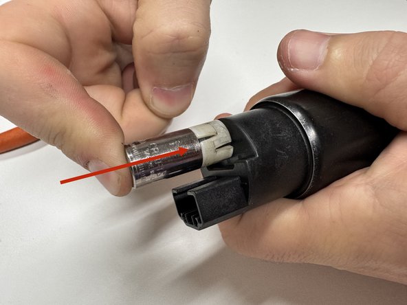 Reinstall the pump spacer onto the Hybrid Racing fuel pump.