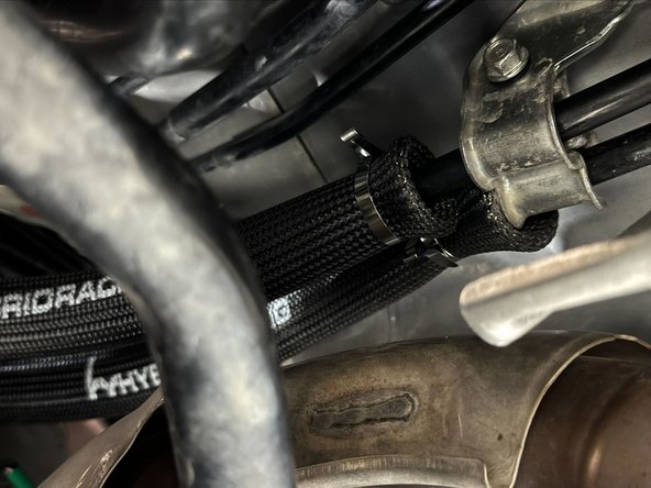 Use the supplied Stainless steel ties to pinch heat sleeve only shifter cables.