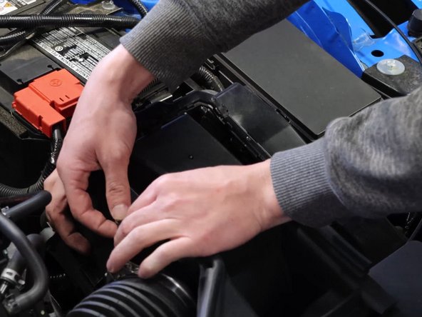 Unclip the MAF wiring harness from the airbox lid and then unplug the MAF and set it aside.