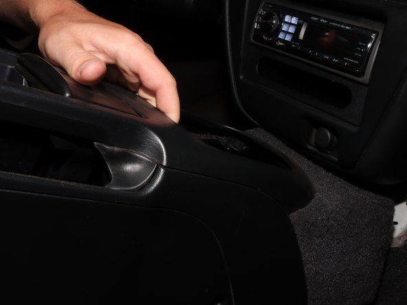 If it does, some trimming of the shift boot may be necessary. Alternatively, you can remove the shift boot if you prefer to leave the shifter assembly exposed.