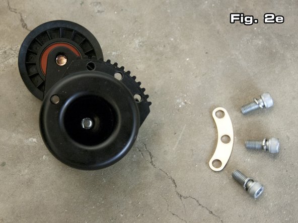 Figure 2e shows the parts that should be loose once the spring housing has been removed.