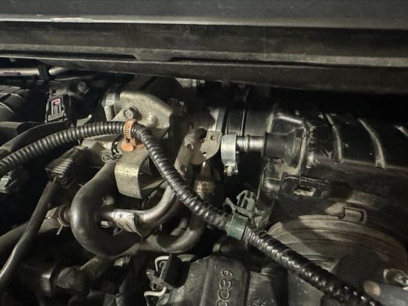 Then push into position and mount to throttle body.