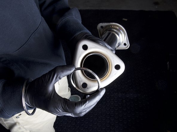 The larger 3 inch connection should be used with any aftermarket front pipe. This will not fit with the OEM front pipe.