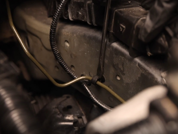 Be careful not to drip brake fluid on any painted surface.