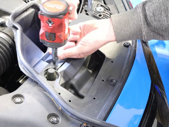 Begin in the engine bay by removing the air intake seal. You will need to remove the airbox lid so remove this section to make gaining access to the tray easier.