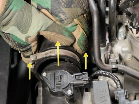 Loosen the intake tube clamp, slide it off of the airbox and then unplug the MAF sensor.