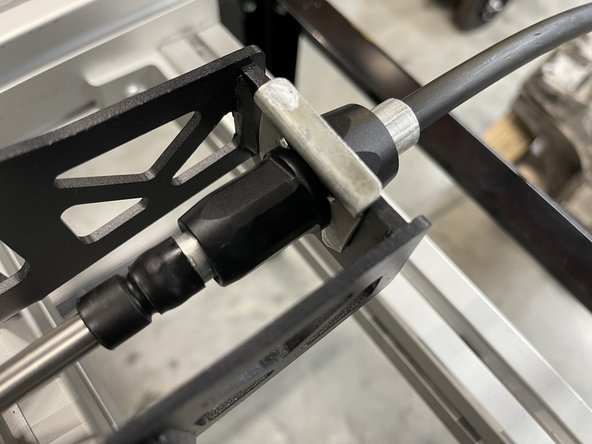 Once the cable is in the shifter, you can clip the end link in place.