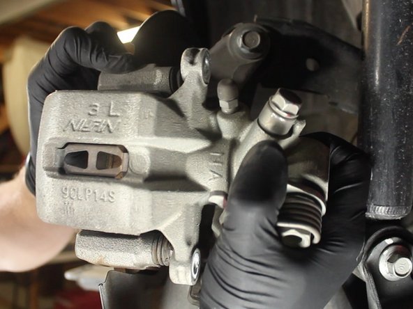 This will allow the removal of the piston housing.