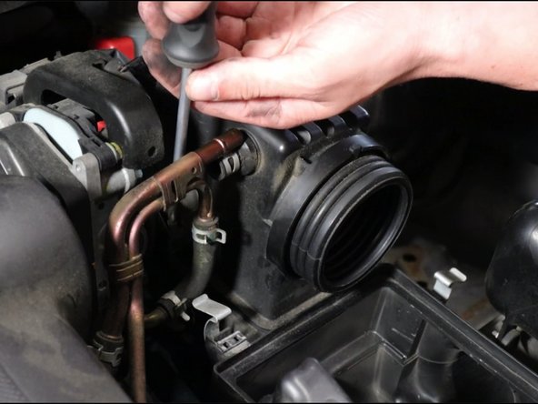 Remove the throttle body clamp.