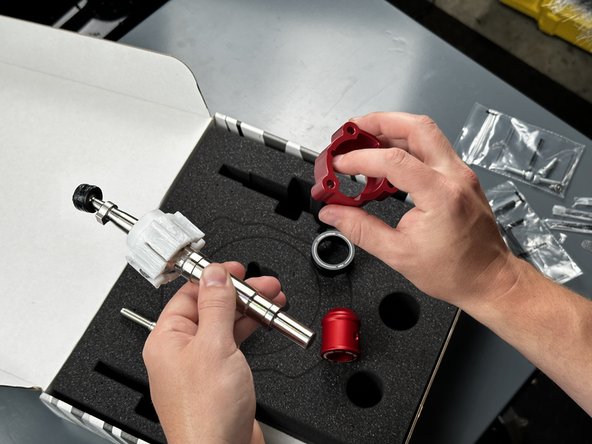 Locate the Shifter Base (#3) and slide it onto the Shifter Pivot Seat.