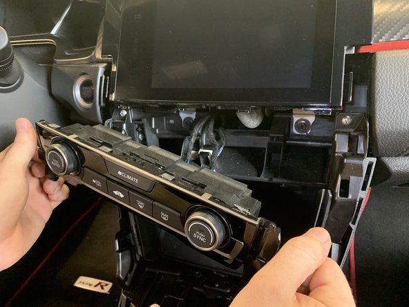 Once it pops out, grab it from the sides and pull a little more. It should pop out.