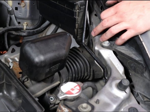 Remove the airbox tube and remove the airbox assembly.