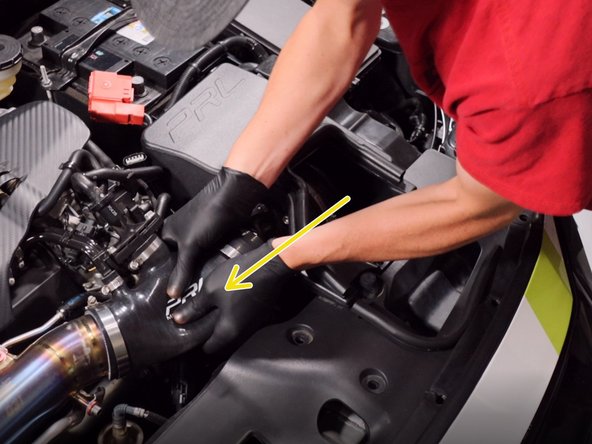 Pull the coupler off and remove the airbox from the car.
