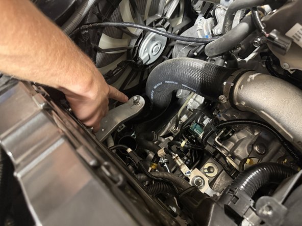 Place the prepared Hybrid Racing intake into the car where the old one was. Pay close attention to the ball mount the box rests on.