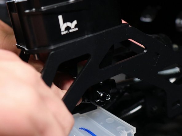 Disconnect the shifter cables.