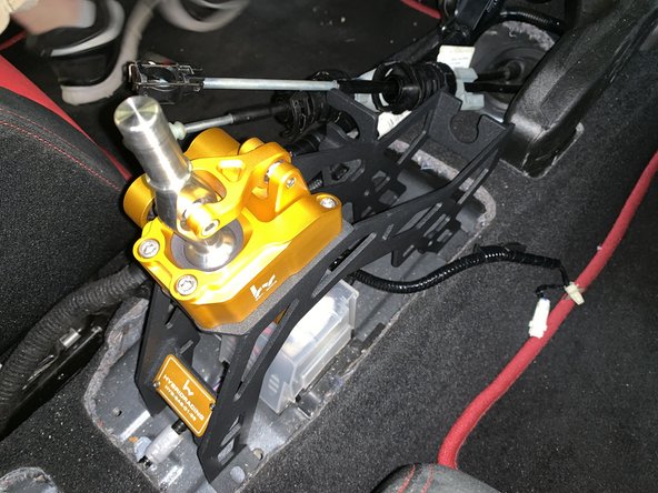 Install the Hybrid Racing shifter and line up the shifter cables.