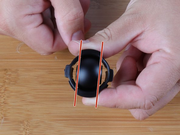 This process is very easy. Hold the bushing with the Hybrid Racing logo facing upwards.