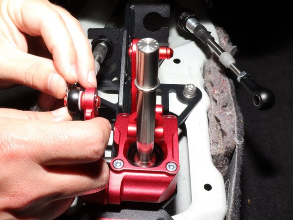 Use the supplied washers and cotter pin.