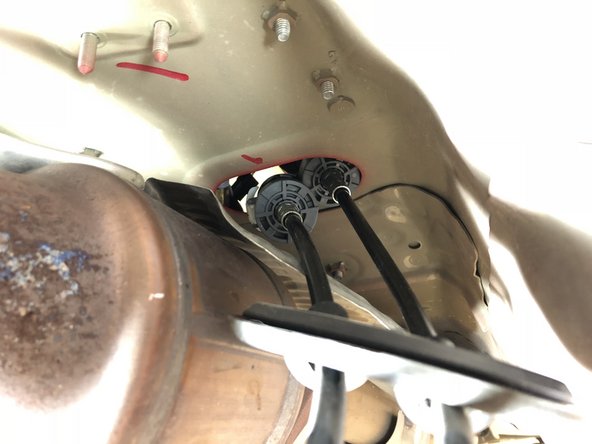 Once the seal is loose it should just pop out. This is the last thing holding the cables to the car.