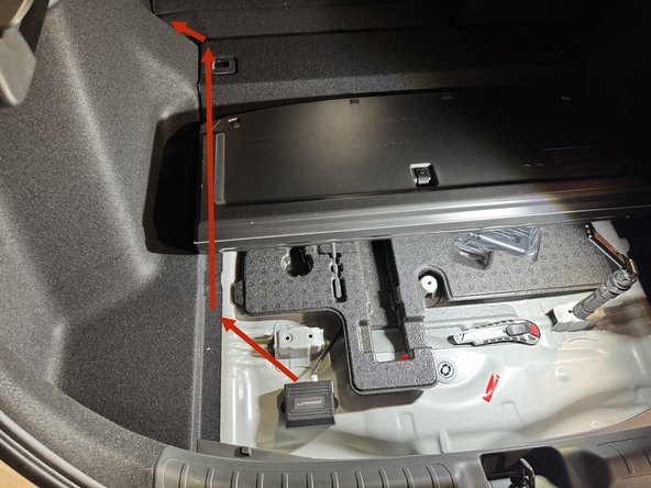 Fold the rear seat down to give you access to the panels.