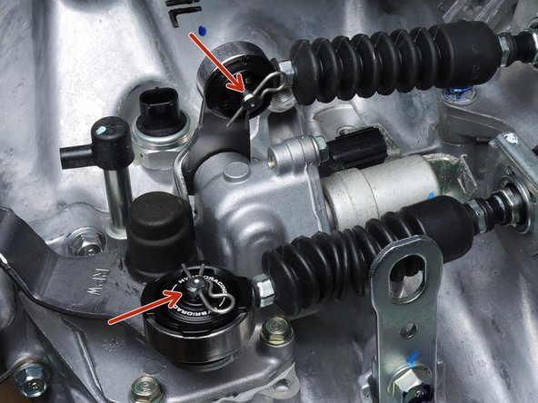 Use the supplied clips to hold the bushings onto the gear selector.