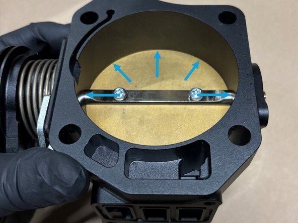 Focus on the edges of the throttle plate and the areas where the plate rests. They must be completely free of oil, debris, and other residue. (Image 2 &amp; Image 3)