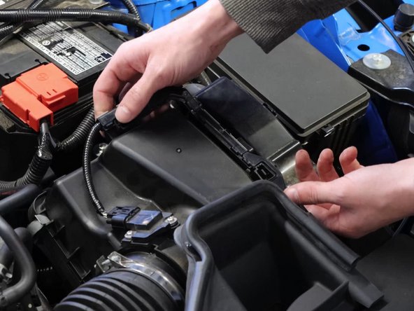 Unclip the MAF wiring harness from the airbox lid and then unplug the MAF and set it aside.