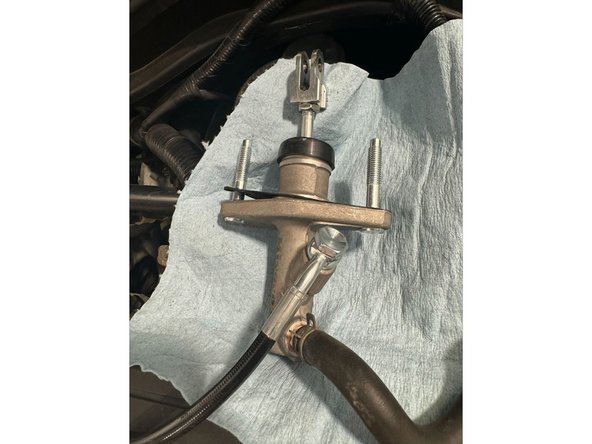 Put the Clutch Line on the left side of Reservoir hose as shown in Picture 2.