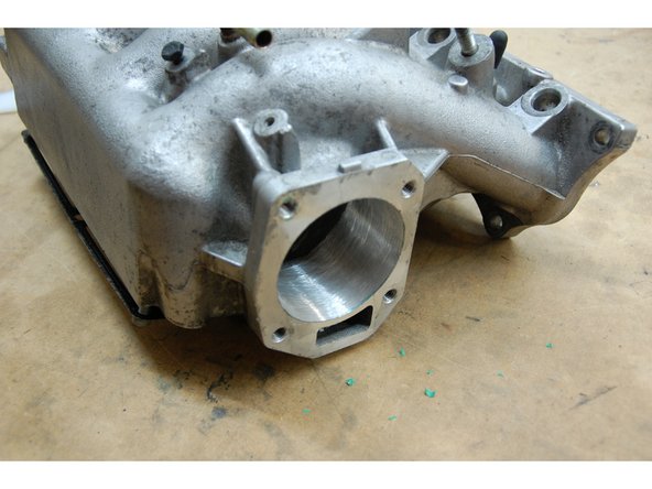 Remember that it’s better to open the hole up too big than too small. It’s very important to thoroughly clean your manifold after boring it as any aluminum dust left in the manifold could cause damage to your motor.