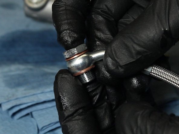 Be sure to install the copper sealing washers on both sides of the banjo fitting.