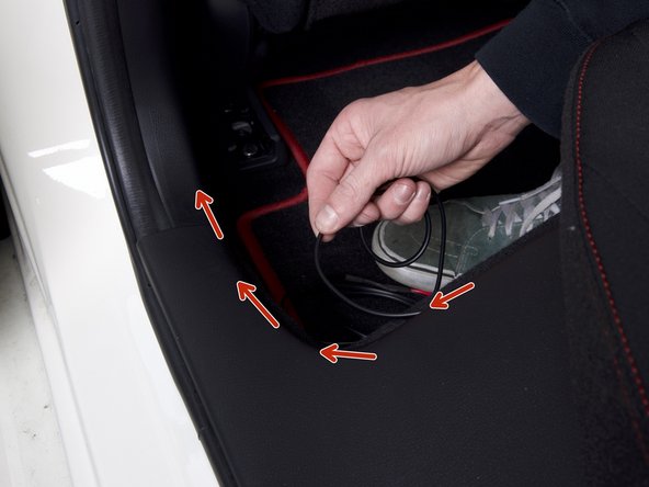 From the seat, run the wiring under the side sill. You can lift the panel upward to make it easier.