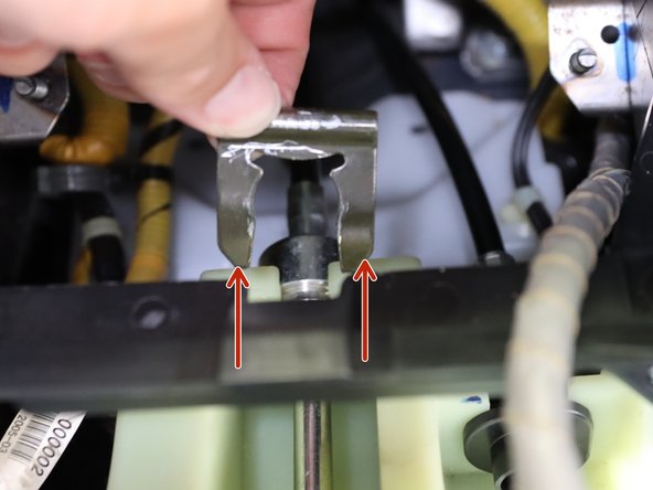 Remove the C clip holding the shifter cable in the shifter. These are typically tough to remove so use a flat head screw driver and pry it up. Pliers also help.