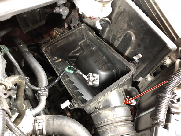 Disconnect the airbox from the lower tube.