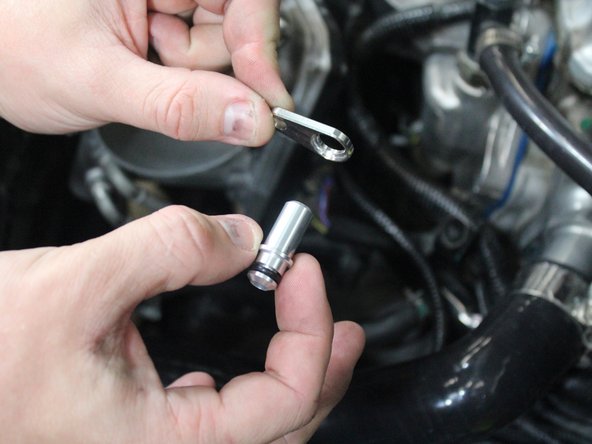 Prepare the vacuum fitting for installation on the map sensor port on the ZDX throttle body.