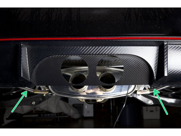 Install the HR carbon rear panel into the bumper using the factory clips. This panel should sit flush at the top and around the bumper seam.