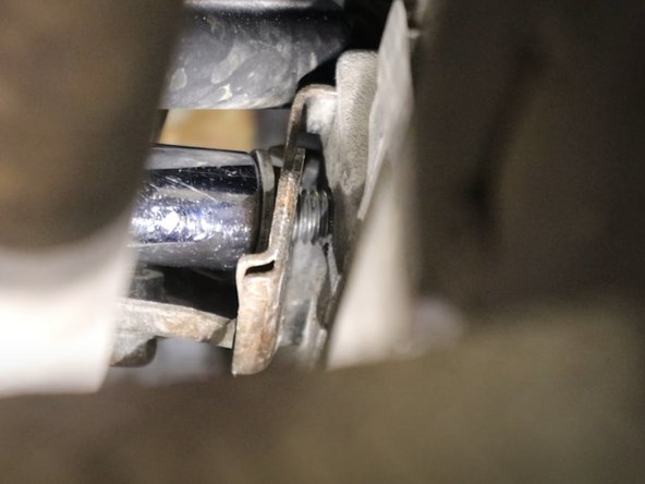 This might be tough to get to. We recommend using a long extension and swivel socket.