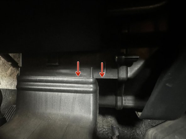 Reinstall the HVAC duct. Push up until the top of duct is flush highlighted part of dashboard (Red Arrow)
