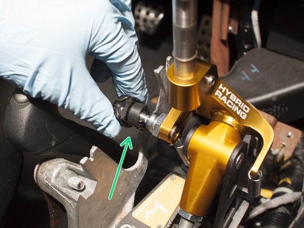 Finally, press the (2) shifter cable end-links onto the shifter until both sides of the metal clip snap into place.