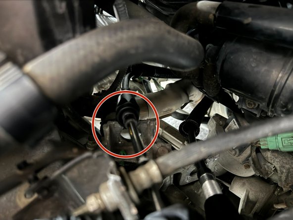 Place FB cable bushing in transmission bracket.