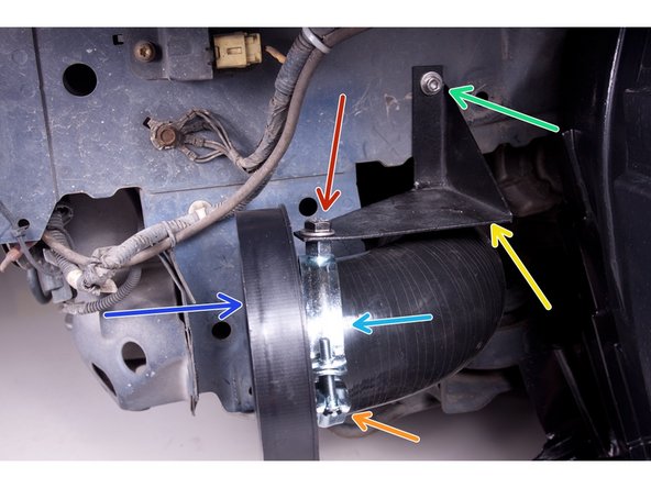 Using the supplied hardware, bolt the lower support bracket to frame rail.