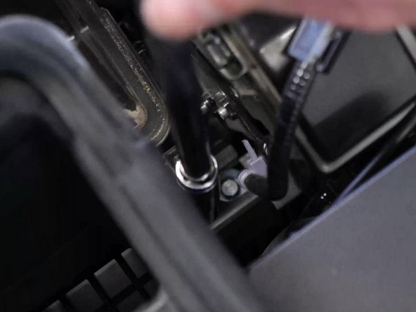 Unbolt the lower airbox and remove it.