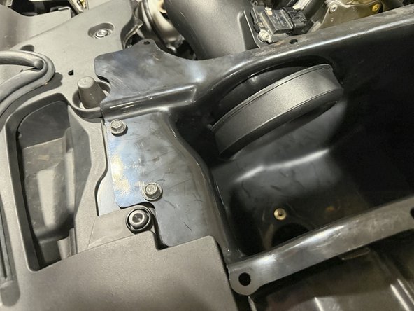 If you want to install the lower air inlet tube, move on to step 26. If you would rather do it later, skip ahead to step 33.