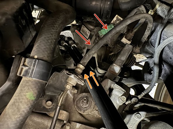 Pass the shifter end of cables underneath the clutch line.