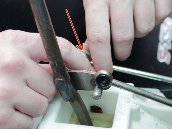 Disconnect both shifter cables. You may need to use pliers to get the OEM cotter pin out. Shown is the Hybrid Racing shifter cable inserts, (HYB-SCB-01-05)