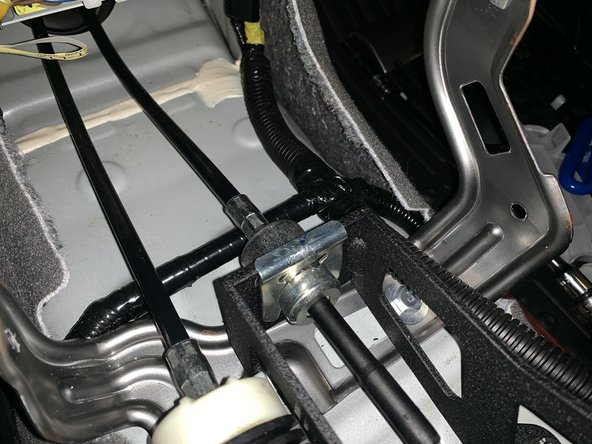 Install the RH side cable and use the OE retaining C clip. You can tap it down into place.