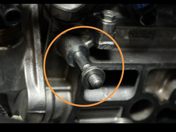 Use one of the nuts and spin it on backwards.