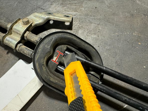 Using a sharp blade, cut through seal as shown in pictures.