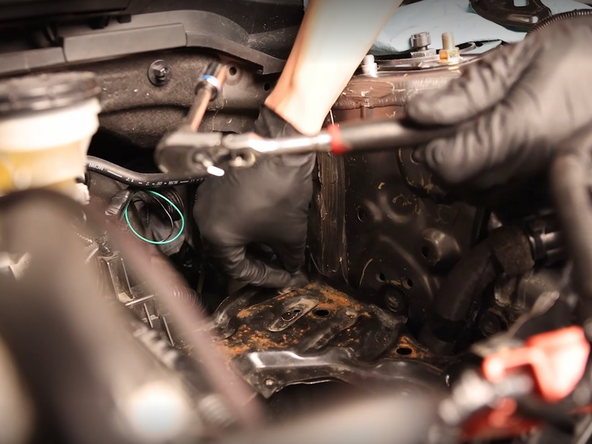 Remove the battery bracket from the car.